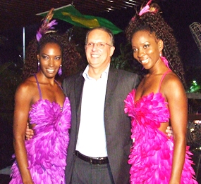 Brazilian Ambassador HE Paulo Cesar Meira de Vasconcellos poses with samba dancers at Zico’s Brazilian Grill and Bar.
